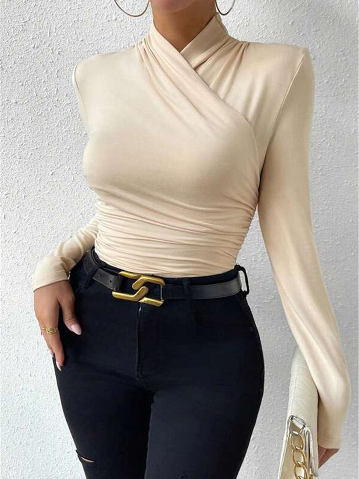 Sleek beige crossover neck sweater slim fit side view