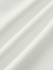 White ruched tank top fabric close-up