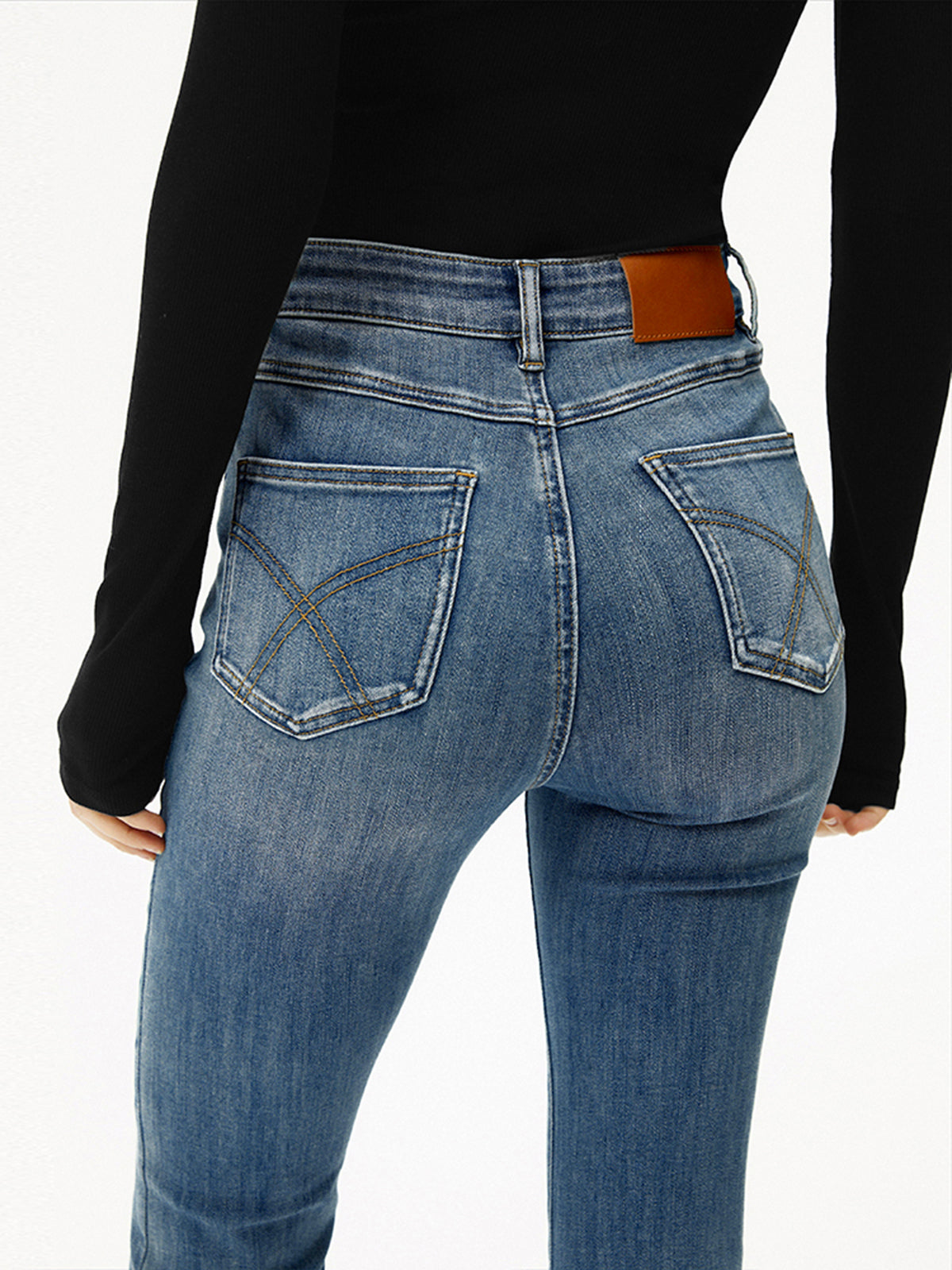 Flared jeans light blue back pocket detail