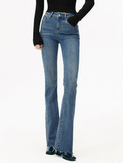 Flared jeans light blue front view with hands in pockets