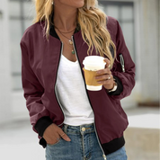 Maroon bomber jacket with black trim front view