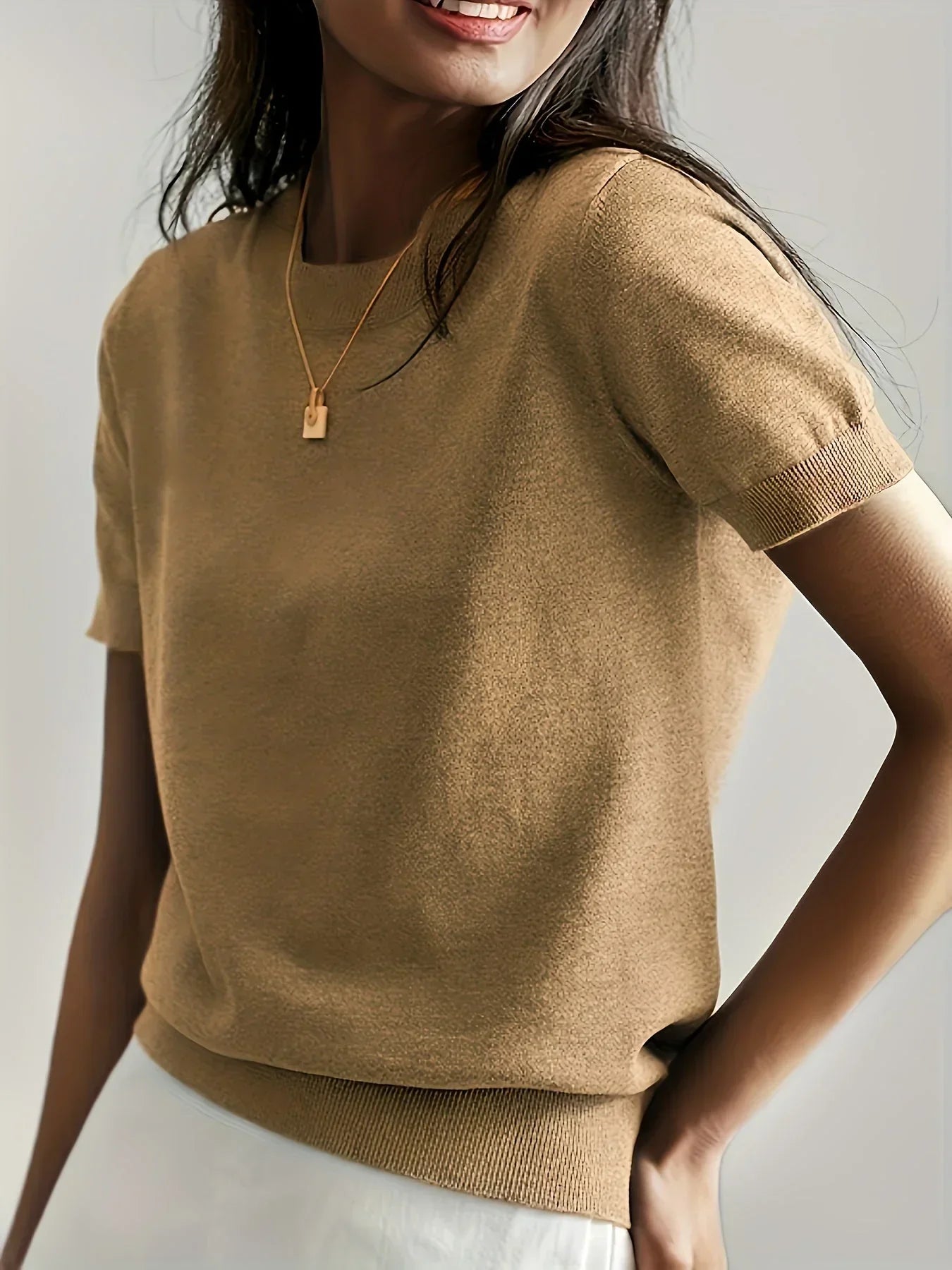 Knitted top beige short sleeves front view