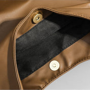 Tan leather slouchy shoulder bag interior detail
