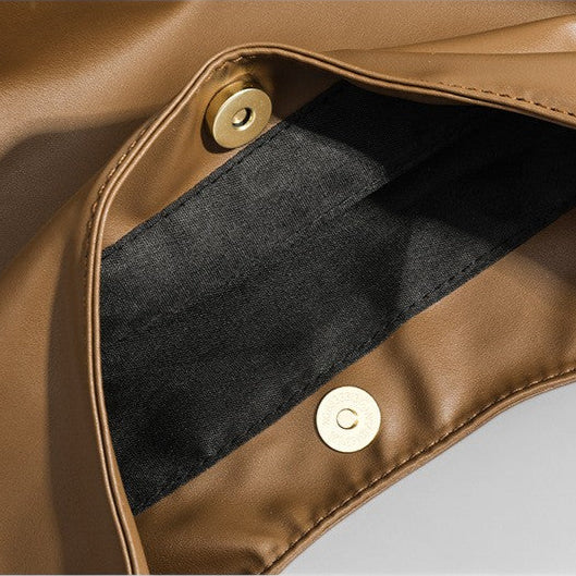 Tan leather slouchy shoulder bag interior detail