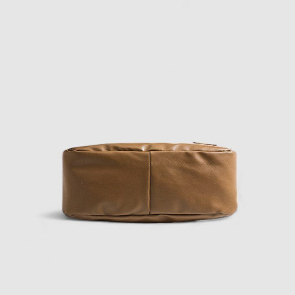 Tan leather slouchy shoulder bag top view