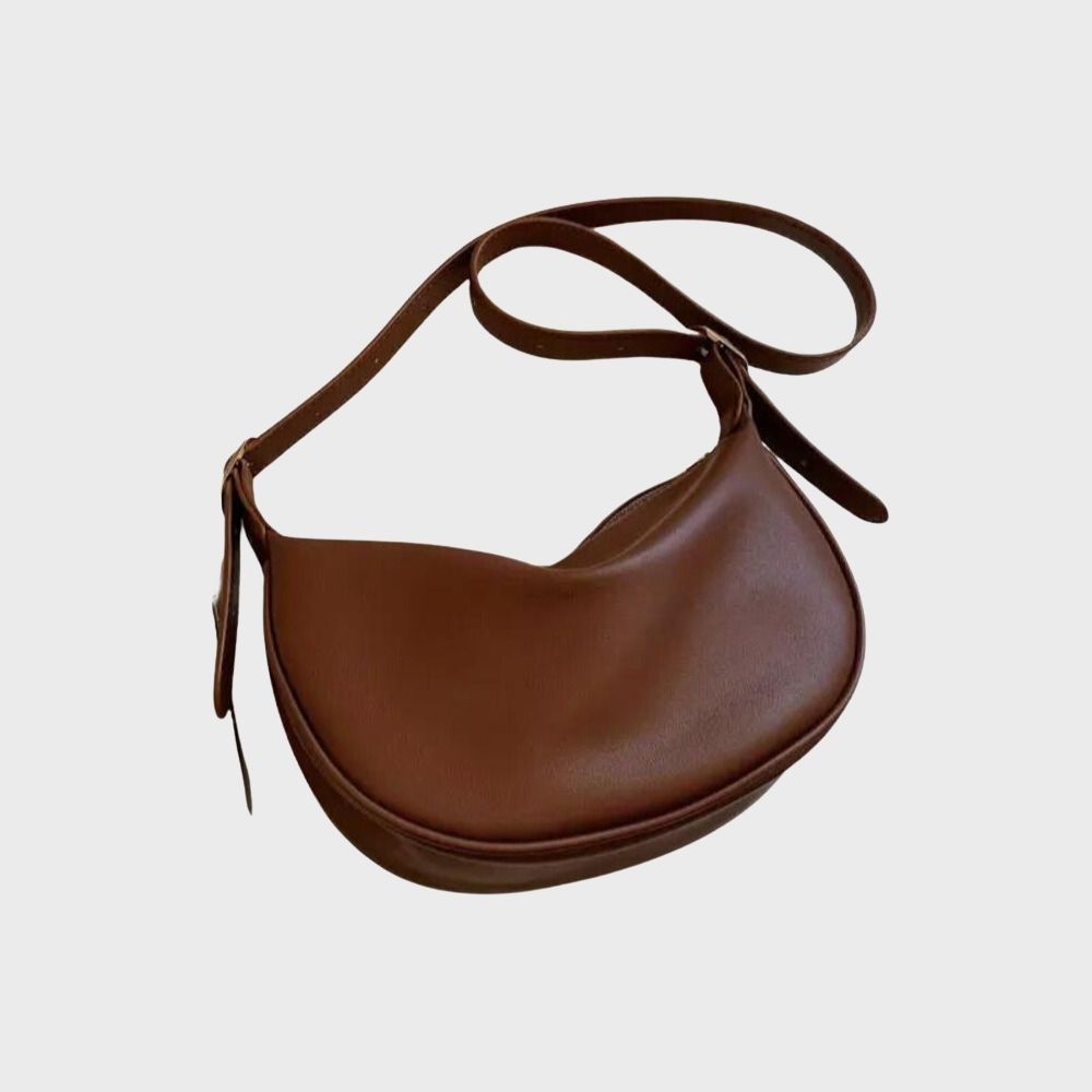 Leren crossbody tas bruin schuin profiel