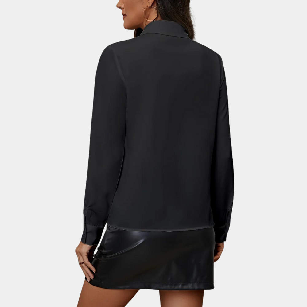 Black blouse back view with black skirt
