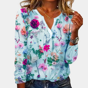 Floral V-neck blouse light blue front view