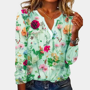 Floral V-neck blouse mint green front view
