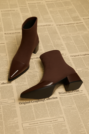 Brown ankle boots with pointed toe and block heel angled view