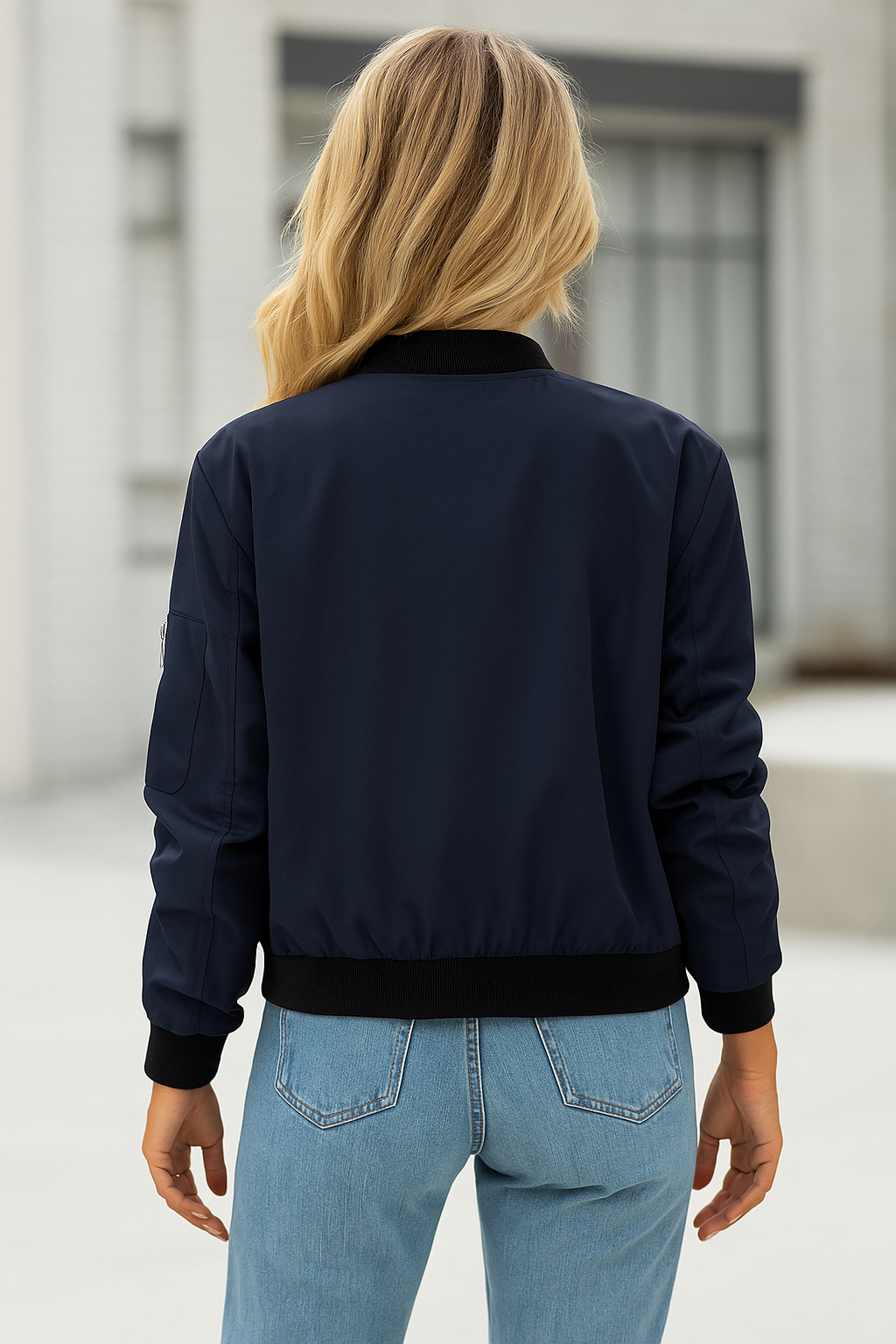 Navy bomber jacket with black trim back view