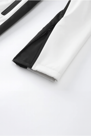Ski jas wit met zwarte details zoom op rits
