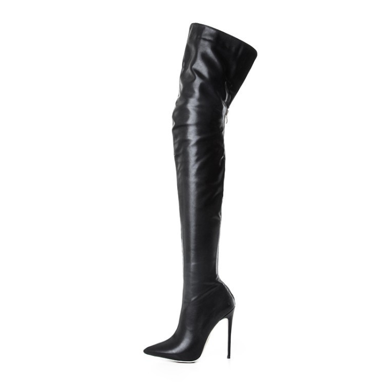 Black over-the-knee boots with gold heel, isolated front view
