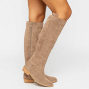 Taupe suede knee-high boots studio shot side view with zipper detail