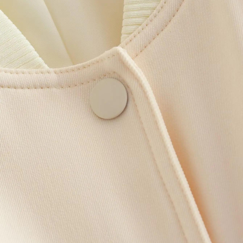 Bomberjack beige detail knoop sluiting