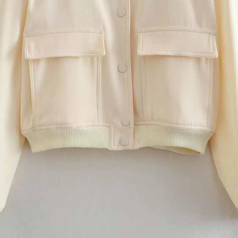 Bomberjack beige met zakken en knopen detail