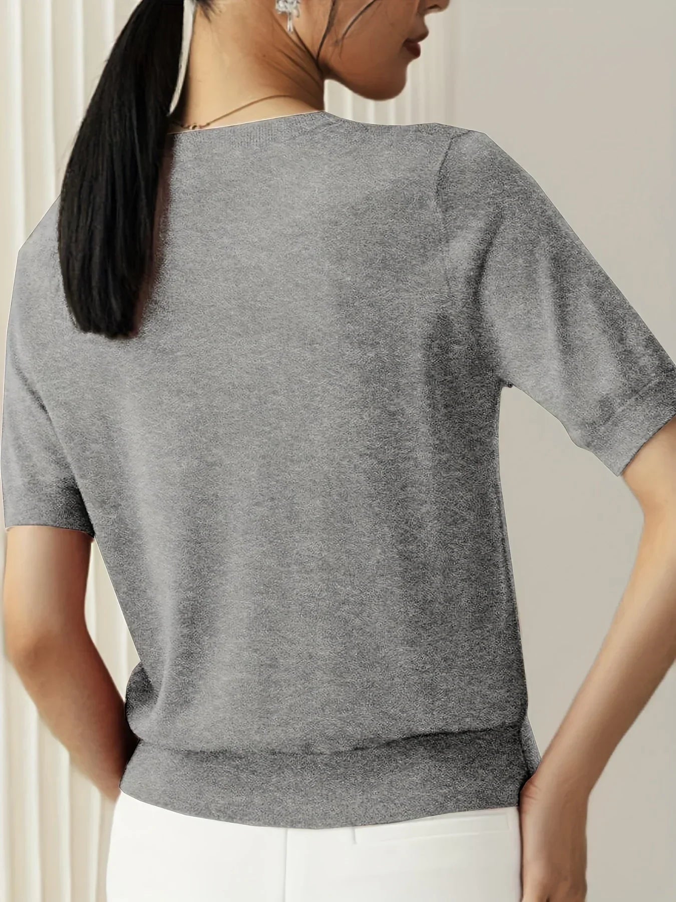 Knitted top gray short sleeves back view
