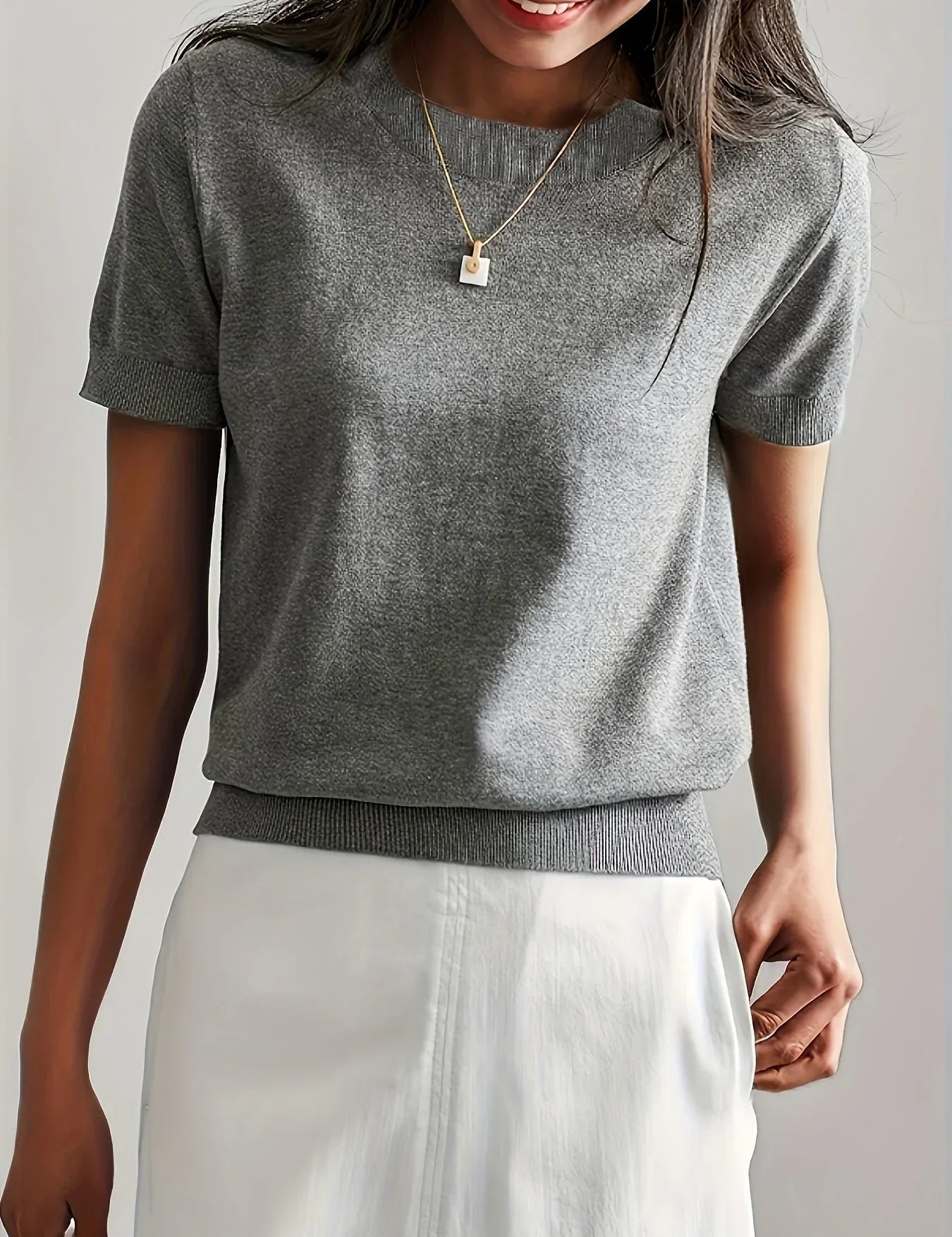 Knitted top gray short sleeves side view