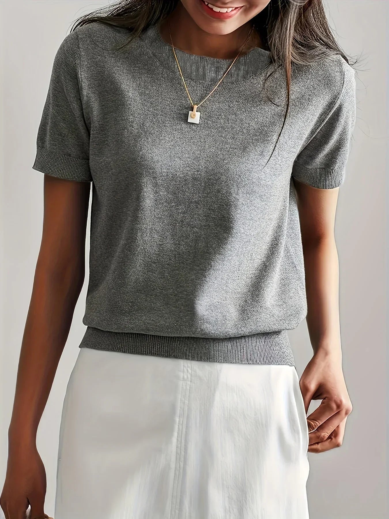 Knitted top gray short sleeves side view