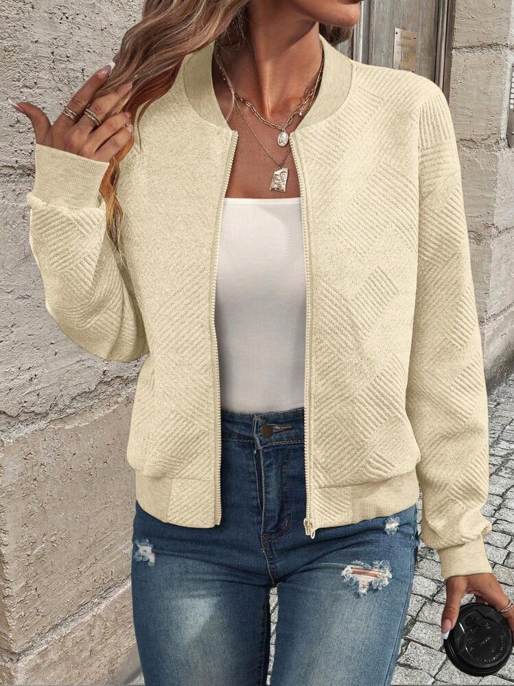 Beige bomber jacket with textured pattern front view