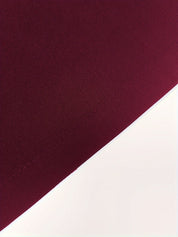 Burgundy sleeveless vest fabric detail
