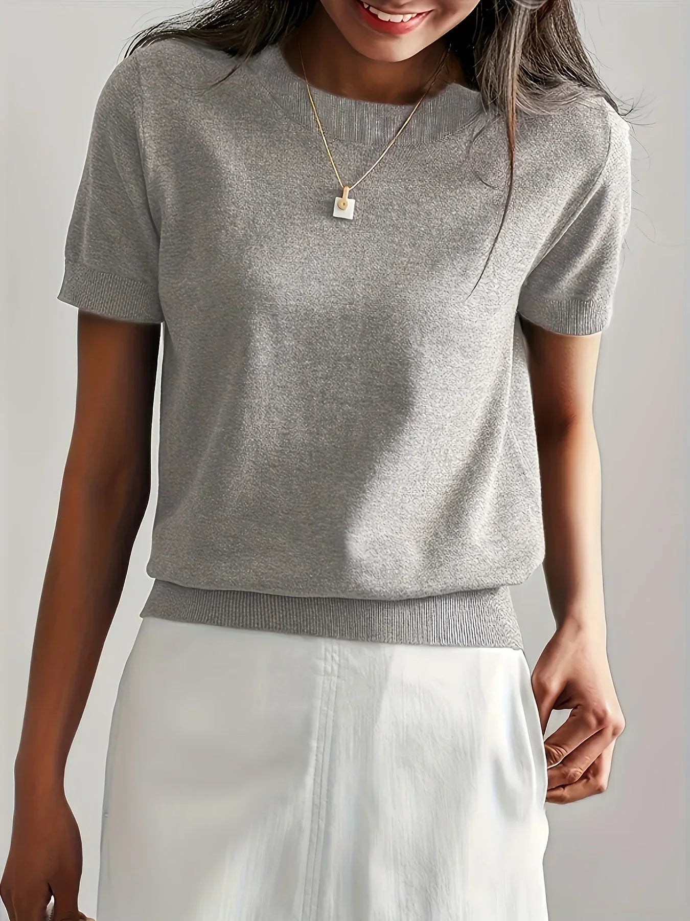 Knitted top gray short sleeves side view