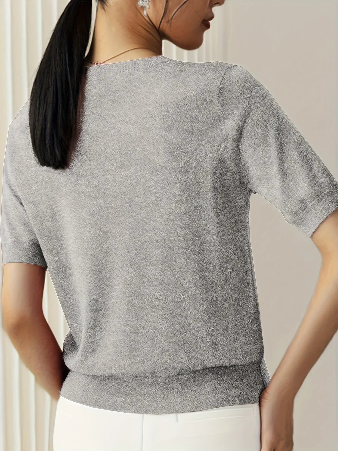 Knitted top gray short sleeves back view