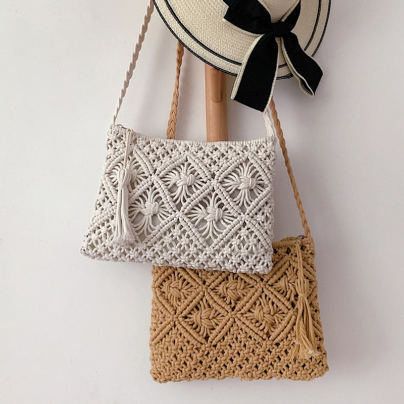 White and beige macramé crossbody bags hanging display