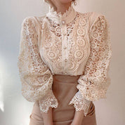 White lace blouse with puffed sleeves upper body detail