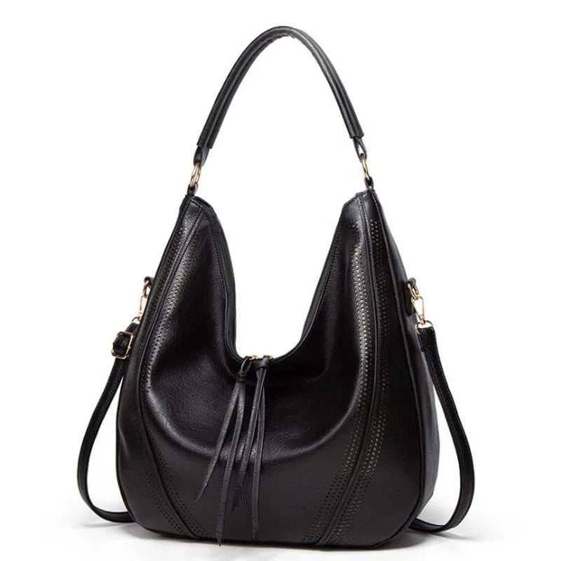 Black leather hobo bag front view with perforated details