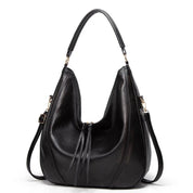 Black leather hobo bag front view with perforated details