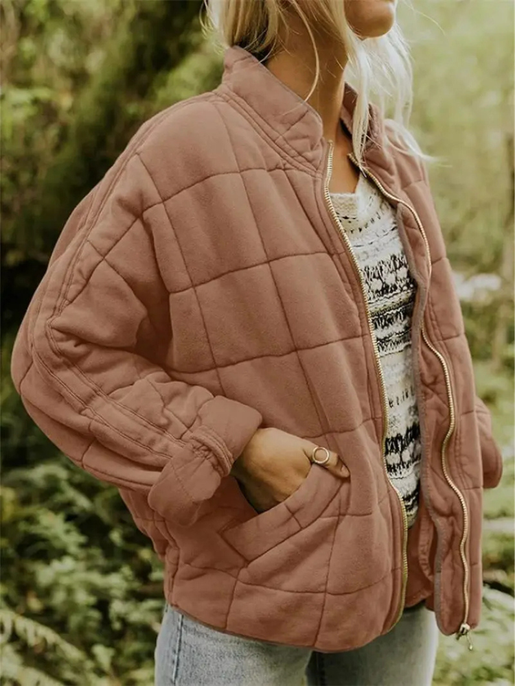 Pink quilted bomber jacket front view