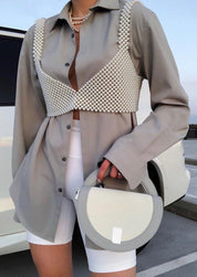 Pearl bralette white worn with gray blazer and shorts, front view