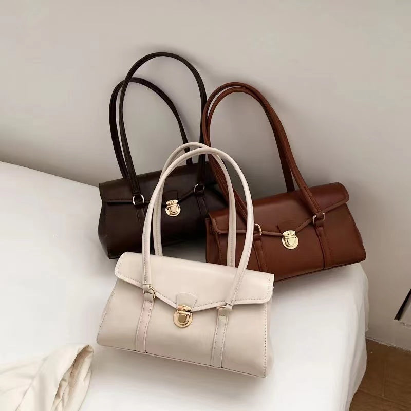 Brown vegan leather shoulder bag front view