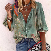 Floral blouse green with button front and ruffled sleeves