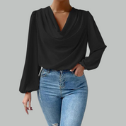 Black draping blouse with long sleeves front view