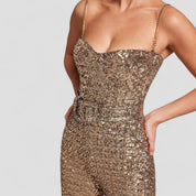 Gold sequin jumpsuit bodice detail close-up