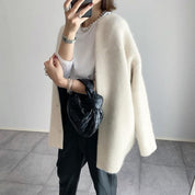 De Ultieme Fluffy Knit Cardigan: Heerlijk Zacht & Stijlvol