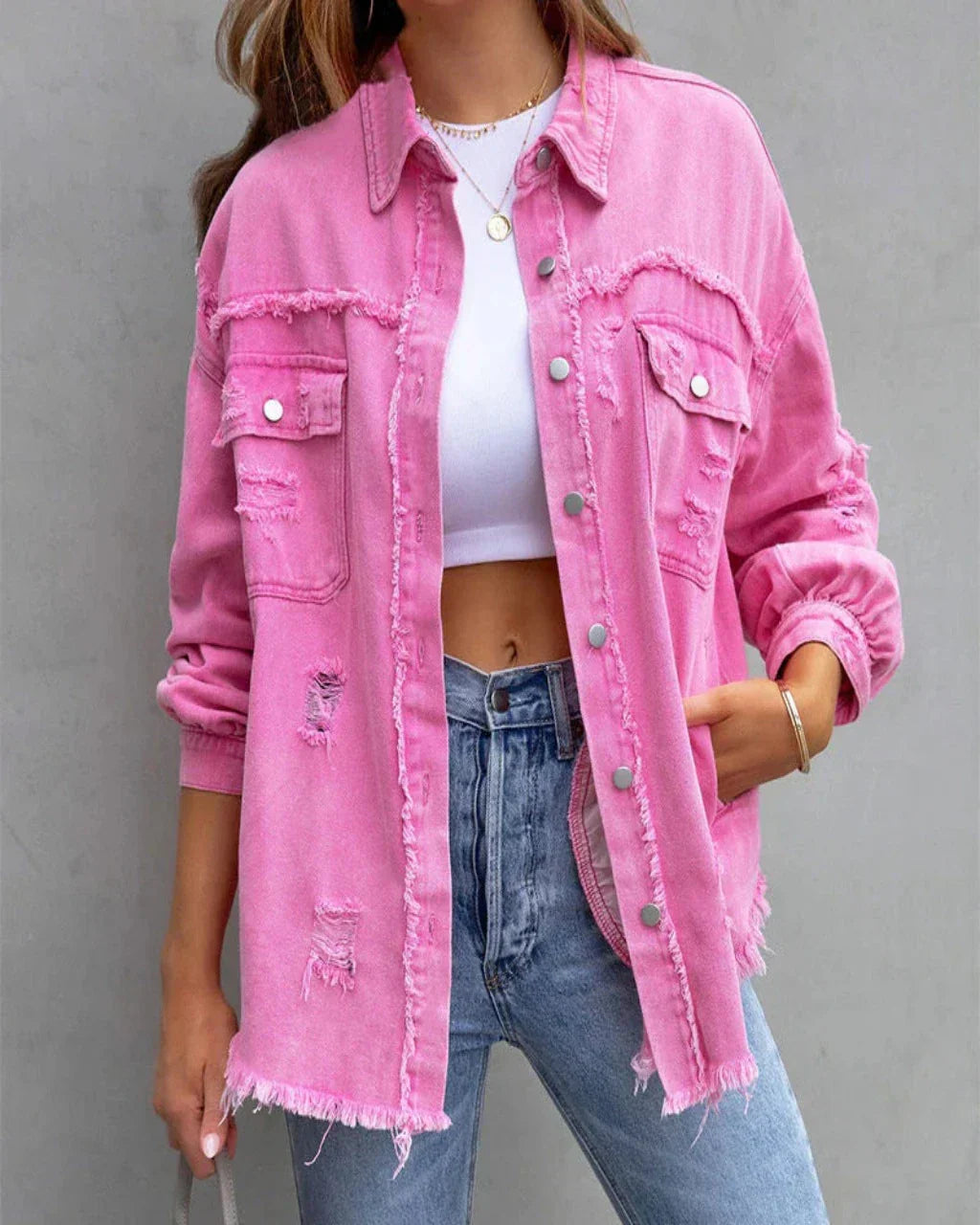 Rafelig denim jasje roze vooruitschouw
