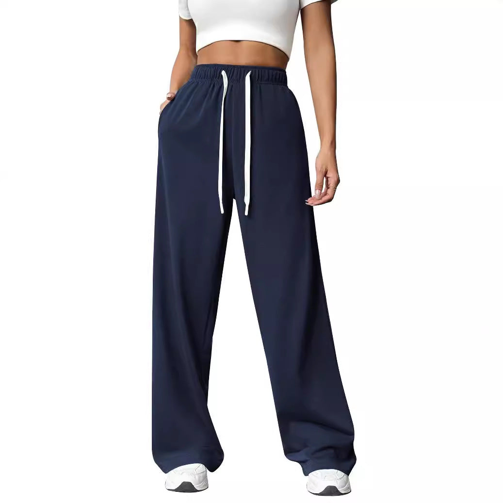 Joggingbroek donkerblauw met witte koordzakken front view