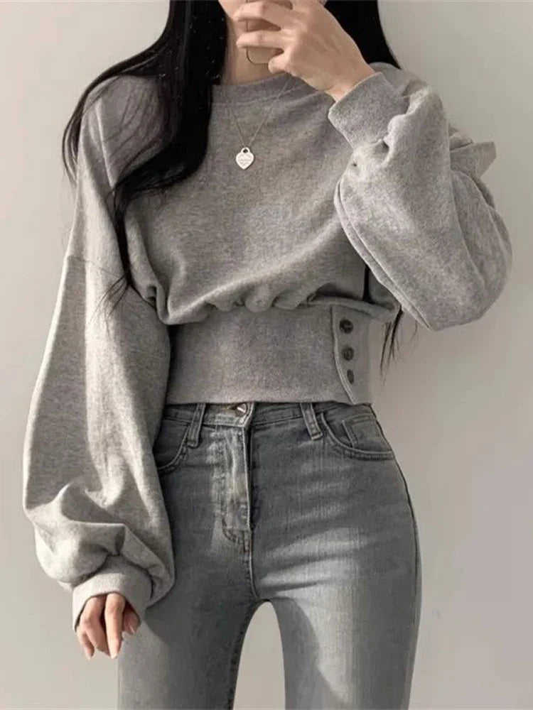 Grijze hoodie met knoopdetails en lange mouwen front view