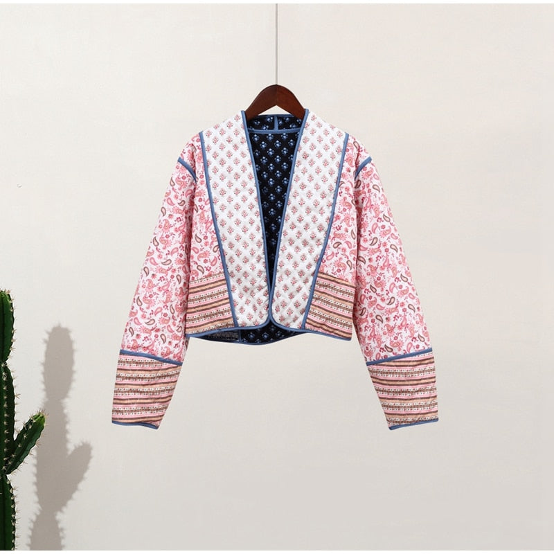 Tweezijdige damesjas met bloemenprint en blauwe randen, hangend