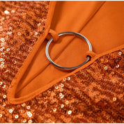 Mini jurk oranje met glitter en ringdetail close-up