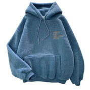 Blauwe teddyhoodie met fleece materiaal en opschrift, front view