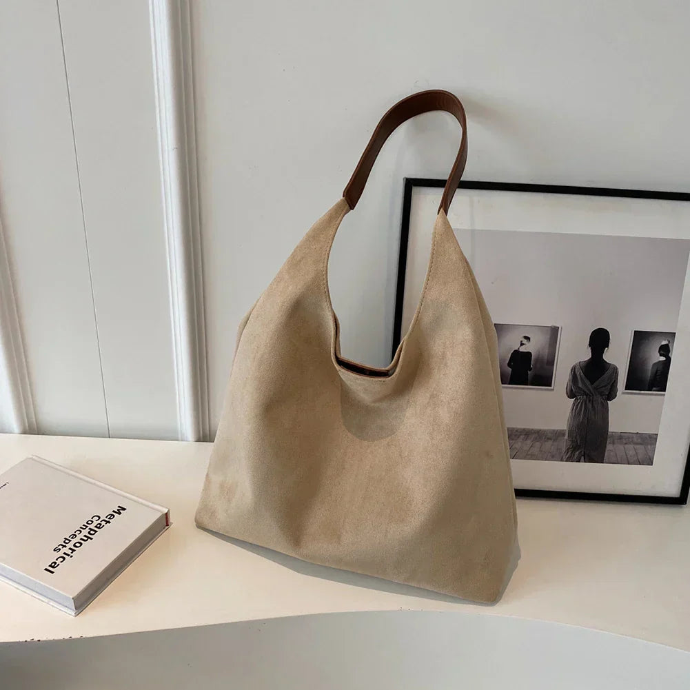 Tas van linnen beige met houten handvatten, zijkant
