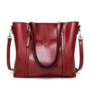 Red faux leather tote bag front view