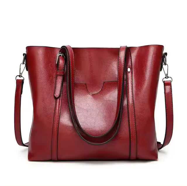 Red faux leather tote bag front view