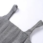 Strakke grijze herringbone set: corsettop + wijde broek – jouw powerlook voor kantoor en avond