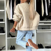 Bomberjack beige gestikt rugzijde