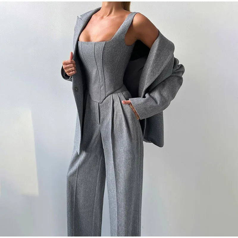 Gray herringbone suit with blazer and wide pants front view